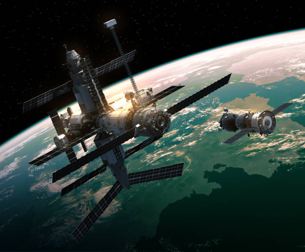 istock Spacecraft Is Preparing To Dock With Space Station 647250816