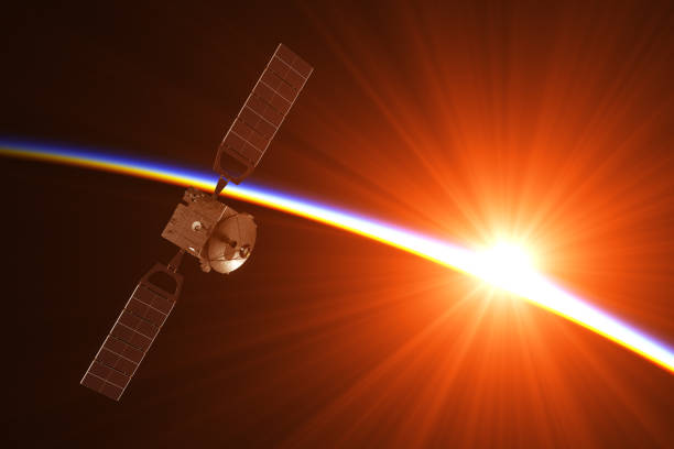 satellite nei raggi del sole nascente - satellite view earth globe sunrise foto e immagini stock