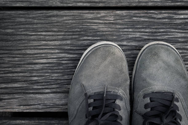istock Shoes on the wooden floor 647251020
