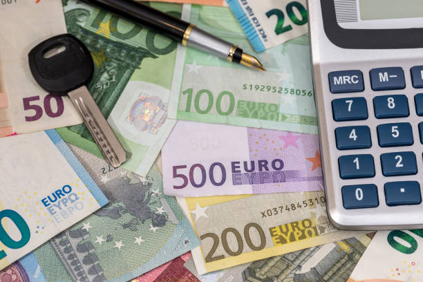 istock euro bills with house key as business concept. 647259432