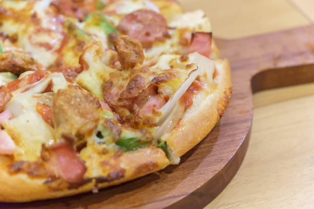 istock Close up of pizza 647266656