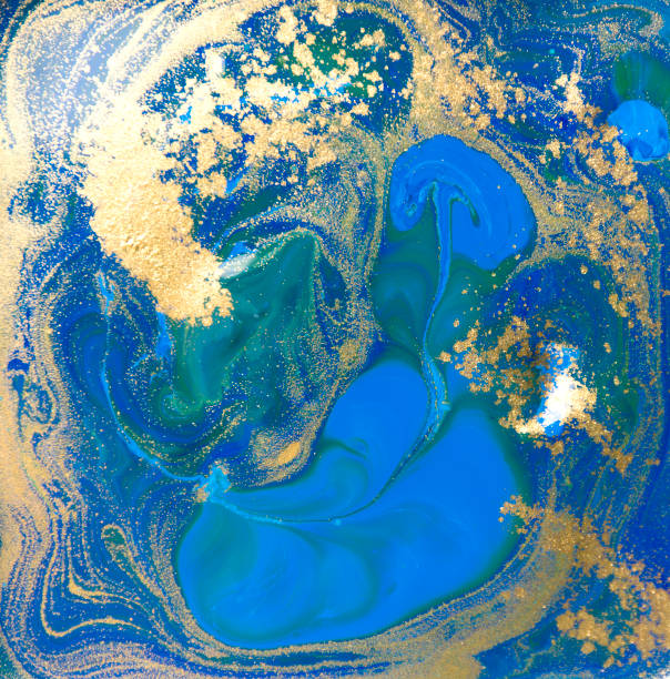 istock Blue and gold liquid texture. Hand drawn marbling background. Ink marble abstract pattern 647269988