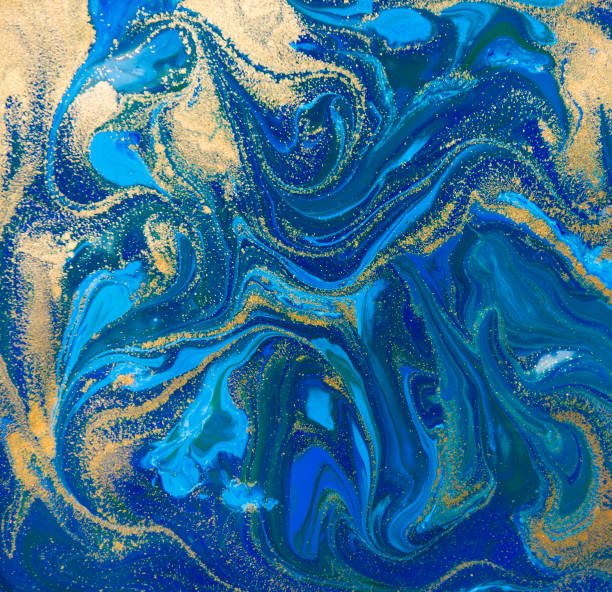 istock Blue and gold liquid texture. Hand drawn marbling background. Ink marble abstract pattern 647270246
