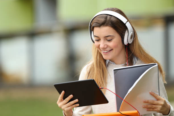 istock Student studying in the street near university 647277538