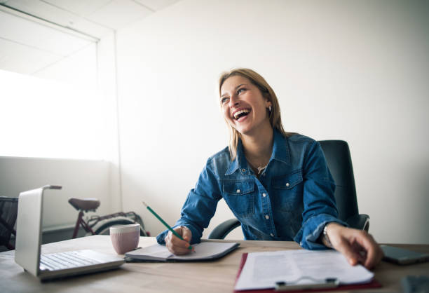 istock Young Businesswoman working at office 647281014