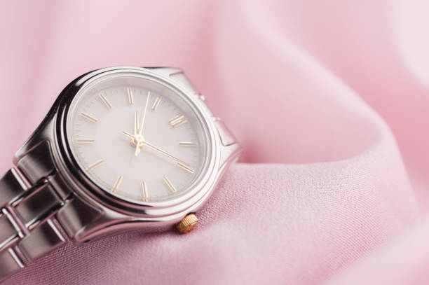closeup classic woman wristwatch with stainless steel bracelet