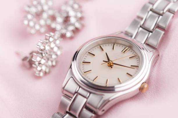 closeup classic woman wristwatch with stainless steel bracelet
