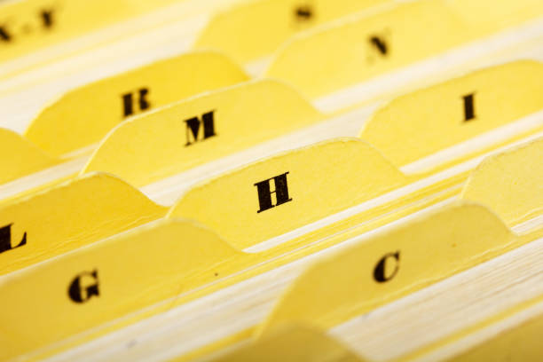 istock Close up of alphabetical index cards in box 647288304