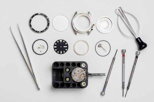 parti di orologio di lusso - watch maker work tool repairing watch foto e immagini stock