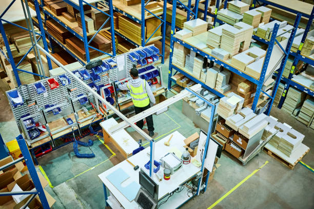istock Male worker working in factory 647297484