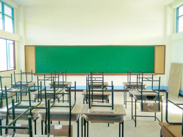 istock empty classroom with blackboard and desk,back to school concept 647300948