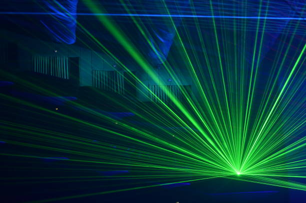 istock People watching a beautiful laser show 647302180