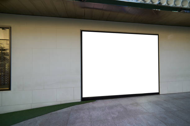 istock Blank advertising billboard on a street wall. early morning . 647308344