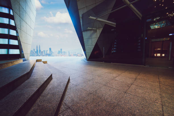 istock Empty marble stair and floor front of modern polygon design buildings. 647308432