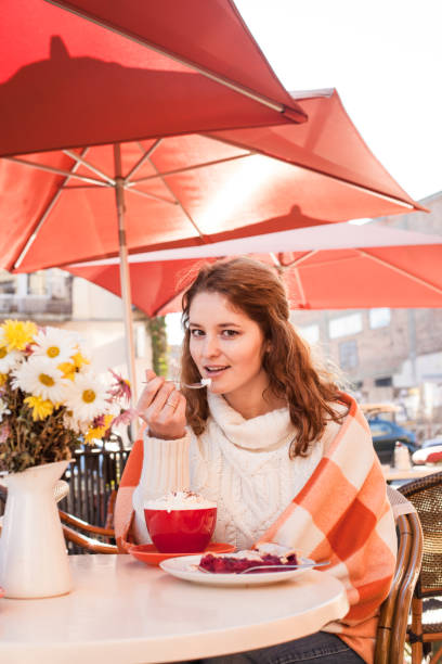 istock Woman in cafe outdoor 647309170