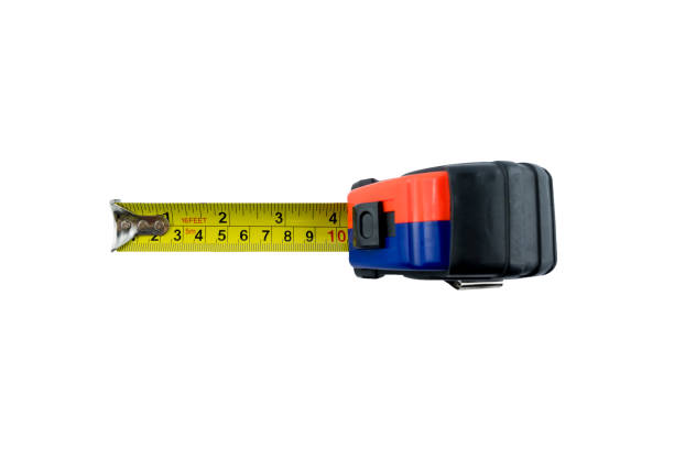 istock Tape measure isolated on white background. 647310504