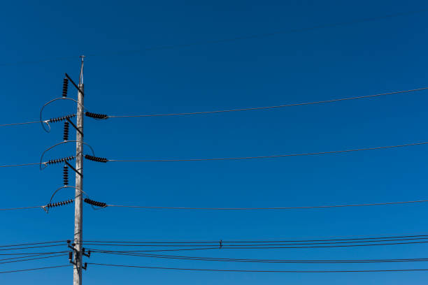 istock power pole and clear blue sky 647321294