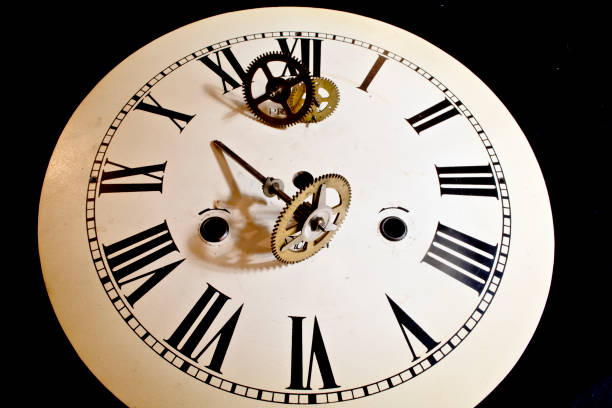 istock Close Up Of Roman Numeral Clock Face 647329204