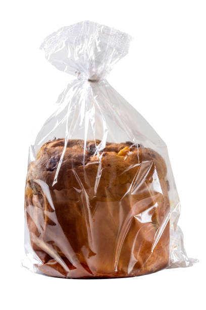 Panettone in plastic bag isolated over white stock photo