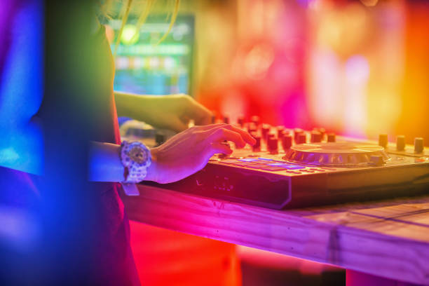 istock woman dj in the party 647334172