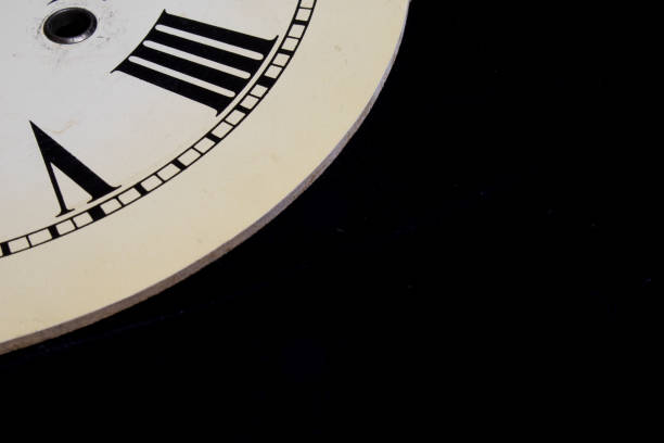 istock Close Up Of Roman Numeral Clock Face 647343674