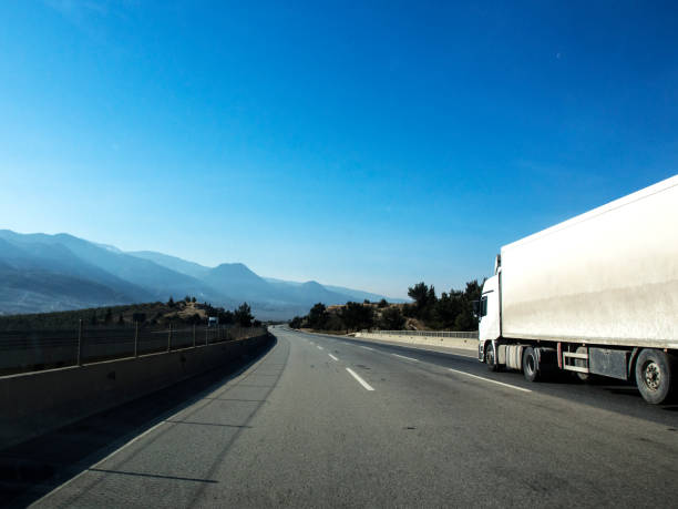 istock Truck On Mountain Road 647348206