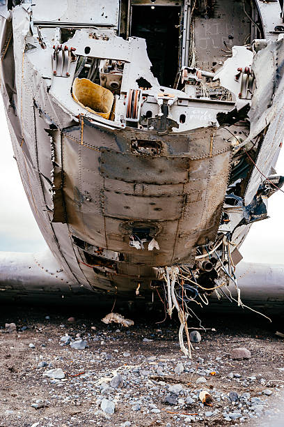 istock Abandoned Military Airplane At Beach 647362437