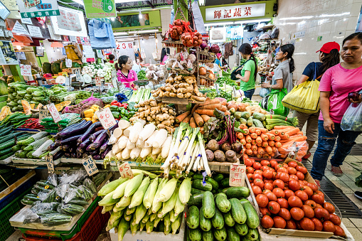 Hong Kong, China - October 26, 2016: Street market stall with fresh vegetables for sale in Hong Kong