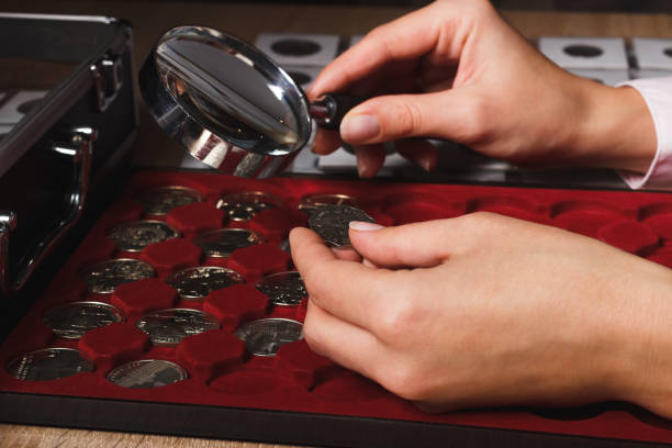 istock Silver coin in the woman’s hand 647366436