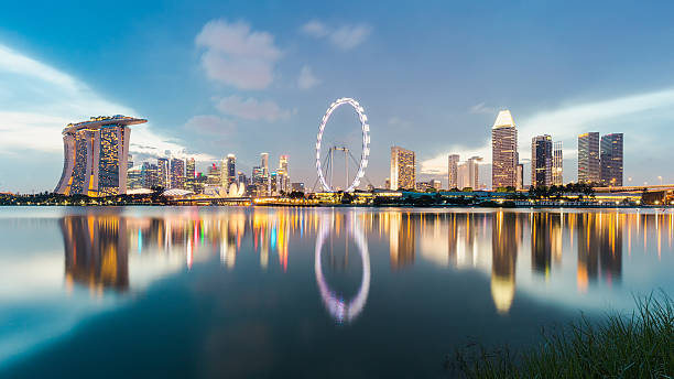 istock Scenic View Of Illuminated City During Sunset 647383481