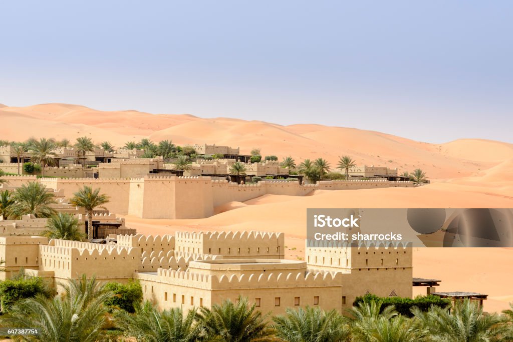 Desert dwelling Village buildings in the  Liwa desert of the United Arab Emirates Abu Dhabi Stock Photo