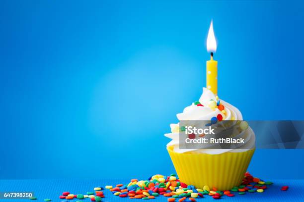 Yellow Birthday Cupcake Stock Photo - Download Image Now - Birthday Cake, First Birthday, Cupcake