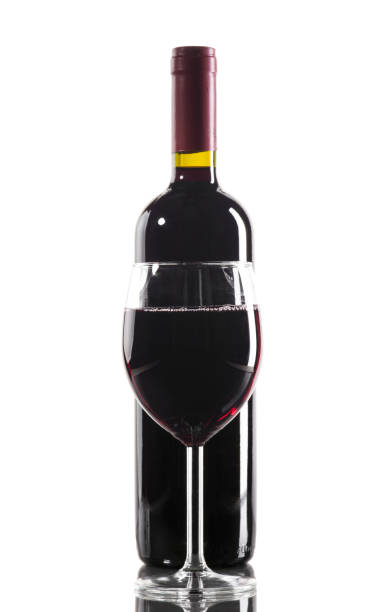 istock Red wine bottle and glass 647405944