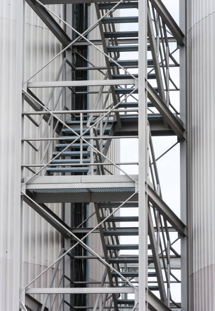 istock Escape route via exterior metal staircase 647409210