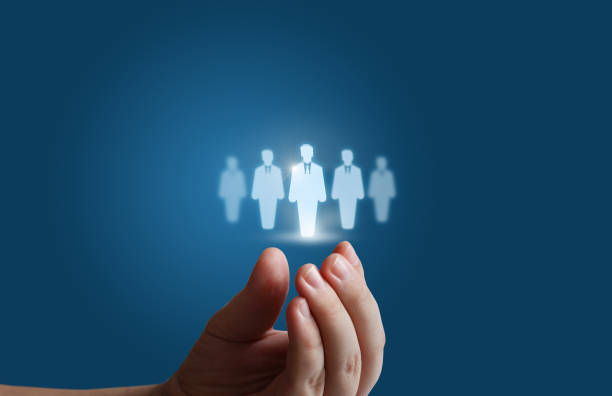 istock Target Customers in the hands of a businessman. 647410126