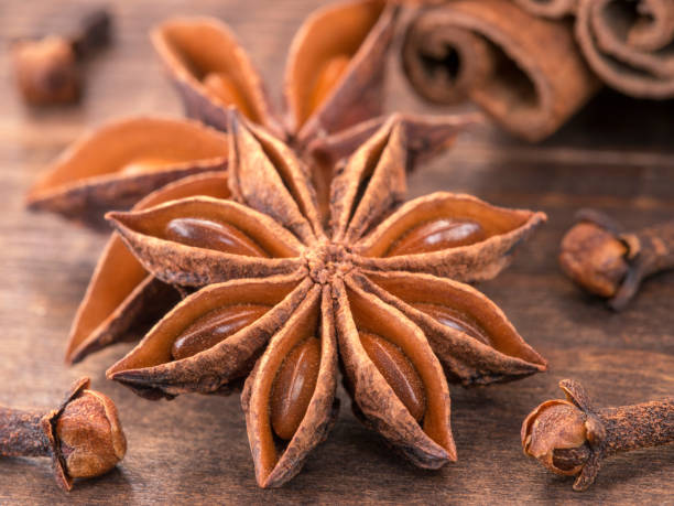 istock Star anise on wooden background 647412934