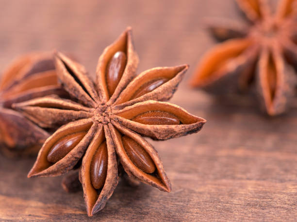 istock Star anise on wooden background 647412970