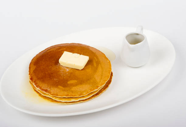 istock Pancakes with butter and honey 647413454