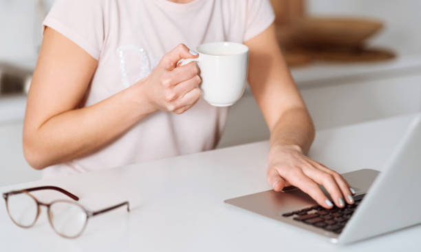 istock Relaxed lady looking for a recipe 647434112