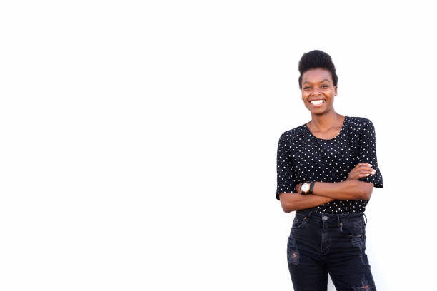 istock Beautiful young african woman standing confidently 647437182