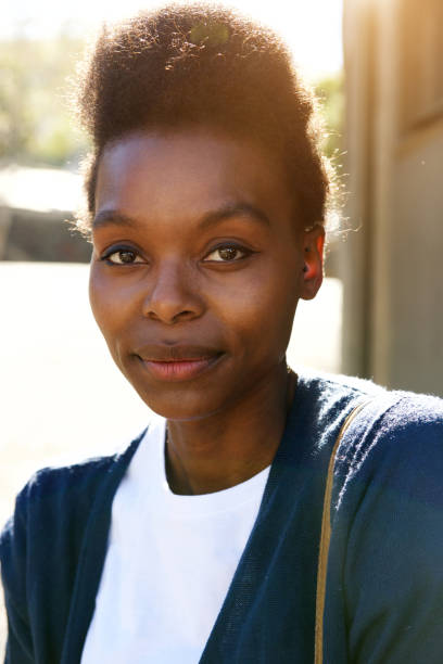 istock Smart young black woman outdoors 647437470