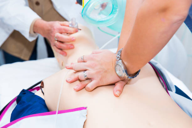 istock CPR seminar,mechanical ventilation and heart massage of CPR dummy 647455396