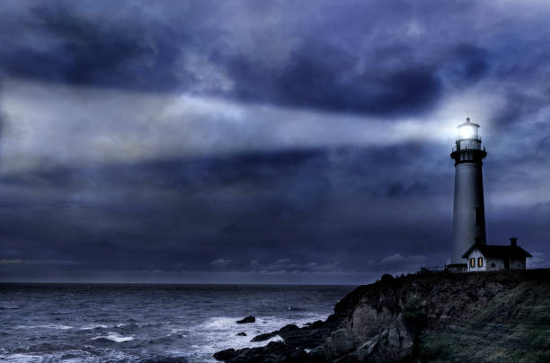 Pigeon Pt. Lighthouse during winter storm stock photo