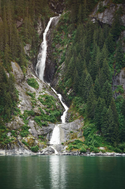 istock High waterfall in Alaskan fjords 647462094