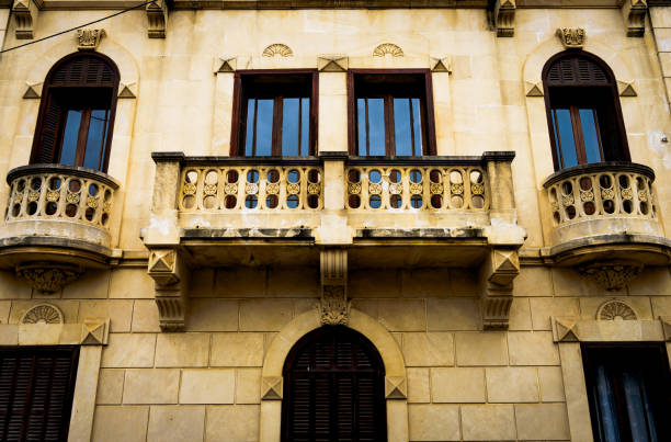 istock Old apartment buildings in a spanish town 647463302