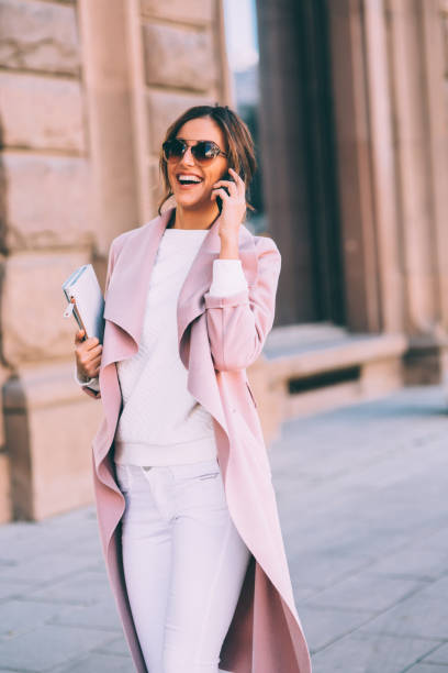 istock Happy woman talking on the phone 647467800