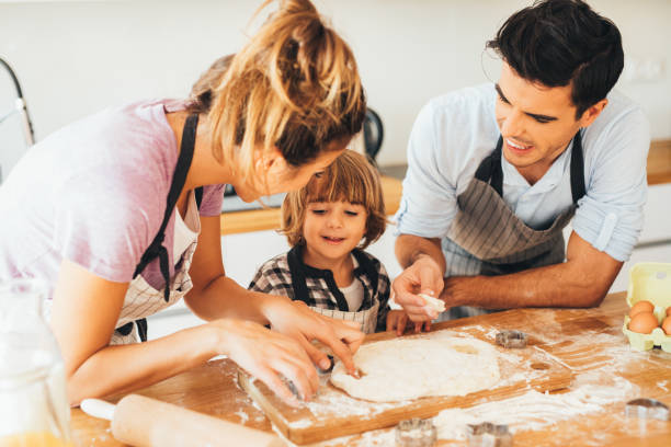 istock Family making cookies in the kitchen 647467890