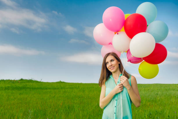istock Girl with Ballons 647473820