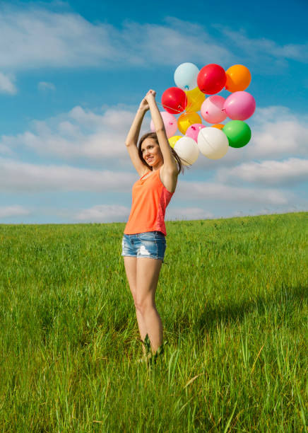 istock Girl with Ballons 647473846