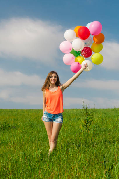 istock Girl with Ballons 647473850